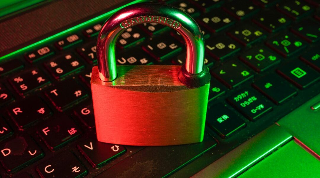 Digital padlock on a keyboard representing file hash verification and integrity checking